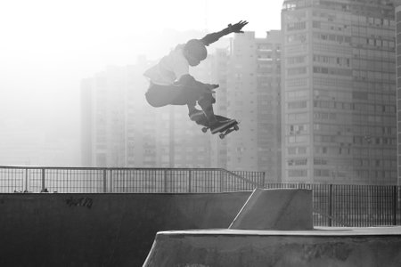 Santos, Brazil. August 2, 2014. skateboarder practicing jumps on a skateboard park in Santos,...