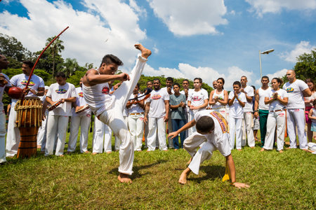 Saoo Paulo, Brazil, 03 April 2016. Group of Brazilian capoeiristas performing at the Ibirapuera Park in Sao Paulo, Brazil.のeditorial素材