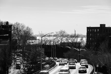 Brooklyn, New York, April,10, 2016. View of the Statue of Liberty from the Broolyn Bridge
