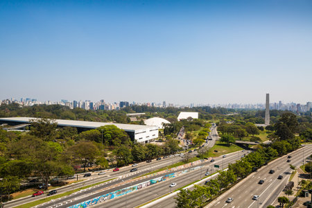 San Paulo Brazil. September 11, 2016. Partial view of the Ibirapuera Park, with Avenida 23 de Maio the front with the premises of the Bienal, Oca and the Ibirapuera Theater. In the background is the Obelisk of Sao Paulo.のeditorial素材