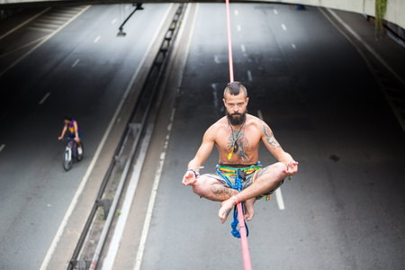 Sao Paulo, Brazil. February 25, 2018. The slackliner, Leandro, usually practices every Sunday at...