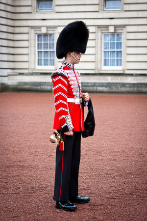 London, England. May 27, 2014. Member of the Queen's official band, called Irish Guard too, wearing...