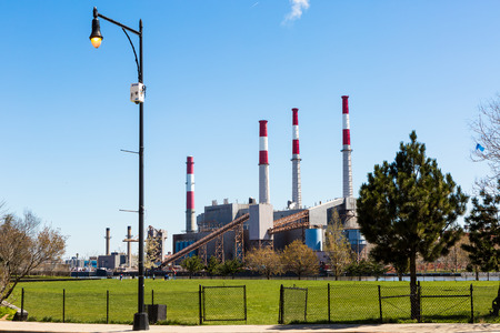 Long Island City, New York. April 10, 2016. Ravenswood Generating Station is a 2,480 megawatt power plant in Long Island City in Queens, New York. It is owned and operated by TransCanada Corporation. The plant uses natural gas, fuel oil and kerosene to power its boilers.の写真素材