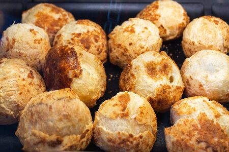 Brazilian snack cheese bread exposed for sale.の写真素材