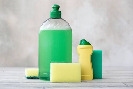 kitchen dishwashing detergent, cleaning powder and spongeの写真素材