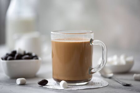 hot coffee with milk marshmallows and chocolateの写真素材