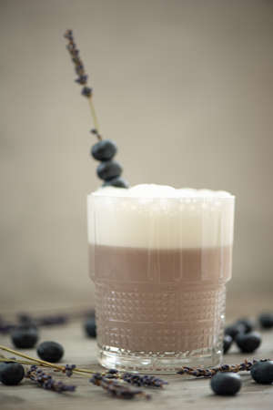 milkshake with lavender syrup and blueberries in glassのeditorial素材