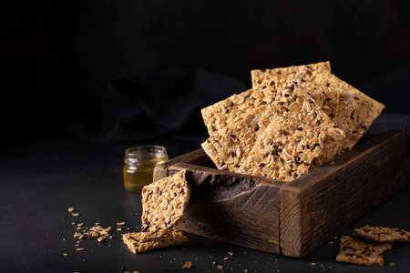 thin whole grain crispbreads with seeds and sesame seeds