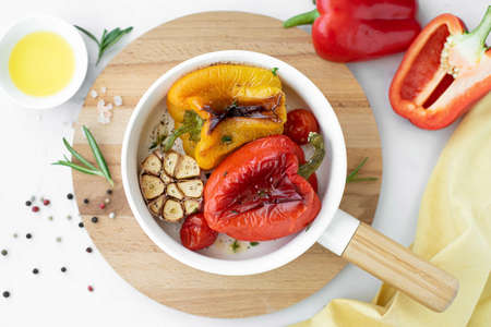 baked bell pepper with herbs and olive oil, top viewの写真素材