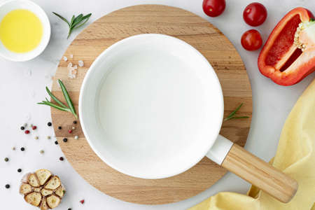 white ceramic baking dish on the table, top viewの写真素材