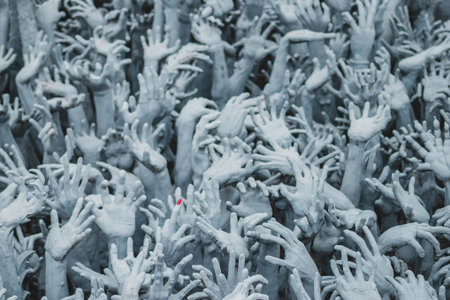 Hands of Buddha statue at Chiang Rai province, Thailand.