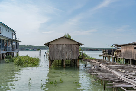 House on stilts in the middle of the waterの写真素材