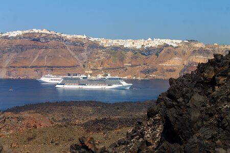 Santorini and the boats from the volcano in Greceの写真素材