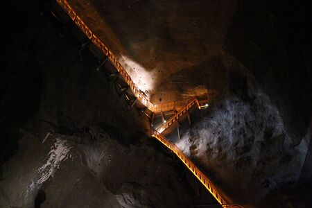 The lighted stairs on the salty wall