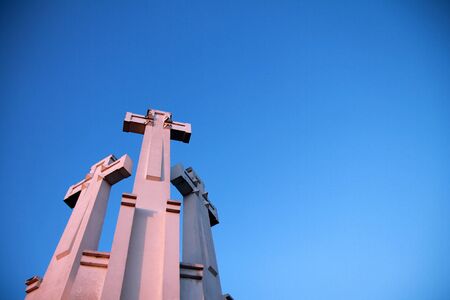 Three white crosses on the top of a hill in Vilniusの写真素材