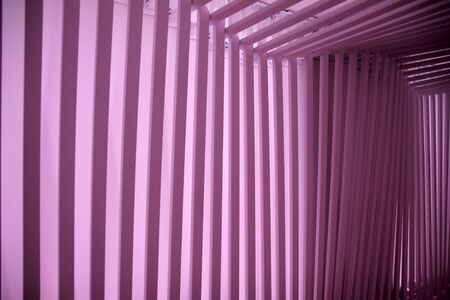 Pink iron artwork with optical illusionの写真素材