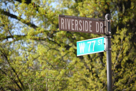 Riverside Drive and West 77th Street historic sign in collegiate districtの写真素材