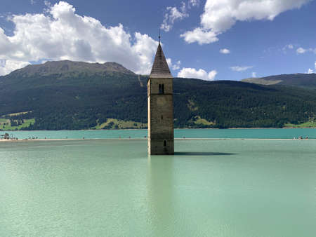 The bell tower of Curon in the italian Alps, remaining part of a submerged city
