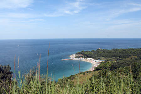 Panoramic picture of the Conero area with its green and white beach and turquoise Adriatic Sea in Italyの写真素材