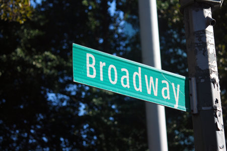 Broadway Street green traffic sign in NYCの写真素材