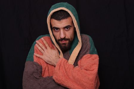 man after the shower in bathrobeの写真素材