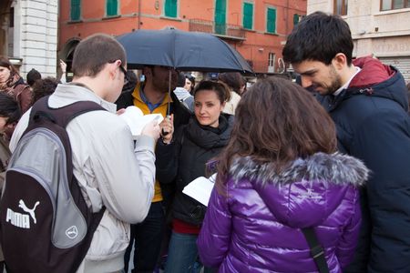 Pisa - 2010 March 19: People frozen during a flash mob on pisa city centre.のeditorial素材