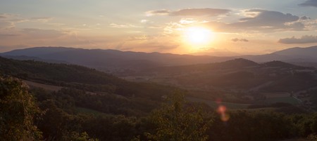 Panoramic View of Sunset in a Mountain Landscapeの写真素材