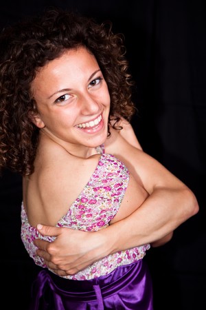 Smiling Sexy Girl with Violet Short Dressの写真素材