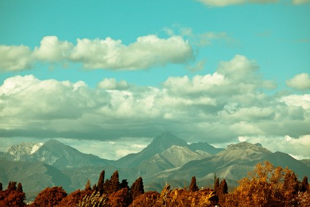 Background Mountains with Cloudy Skyの写真素材