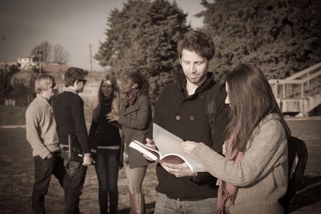 College Students Walking and Talking at Park
