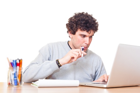 Young Man at Work in Officeの写真素材