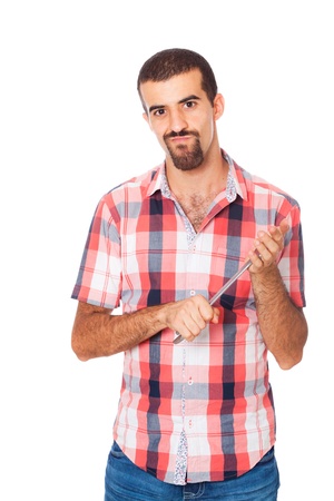 Serious Man Holding a Wrench in the Handsの写真素材