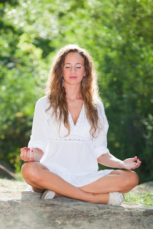 Beautiful Girl Doing Yoga Exercisesの写真素材