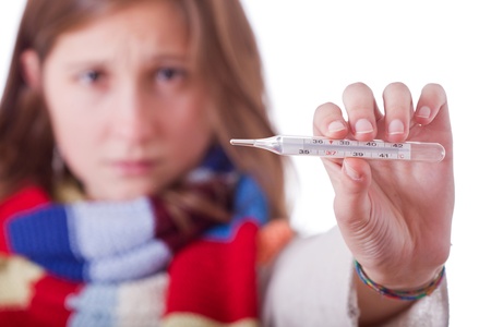 Sick Woman with Thermometerの写真素材