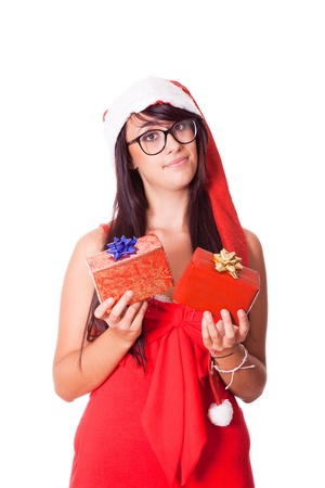 Woman with Santa Hat and Christmas Giftの写真素材
