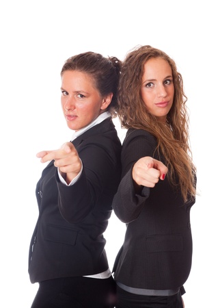 Two Business Women Pointing Their Fingers at Cameraの写真素材