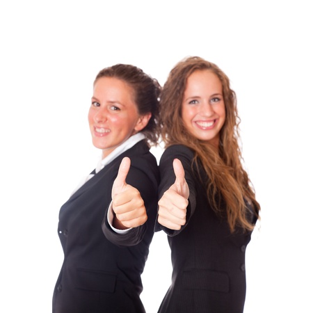 Two Business Women with Thumbs Upの写真素材