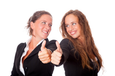 Two Business Women with Thumbs Upの写真素材