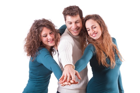 Three Happy Friends with Hands on Stackの写真素材