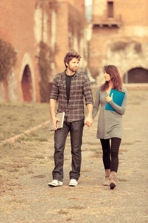Young Couple at Collegeの写真素材