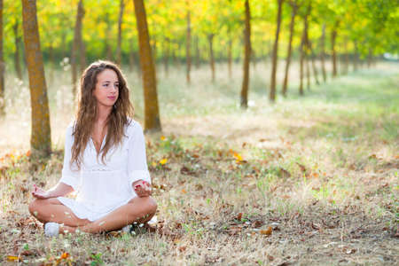 Young Woman doing Yoga Exercisesの写真素材