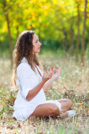 Beautiful Girl Doing Yoga Exercisesの写真素材