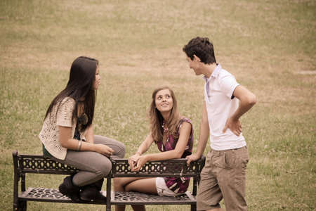 Group of Teenagers Talking at Parkの写真素材