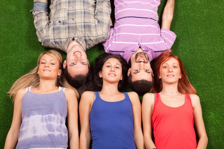 Young People Lying on the Groundの写真素材