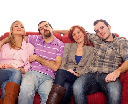 Four Boys and Girls Relaxing on Sofaの写真素材