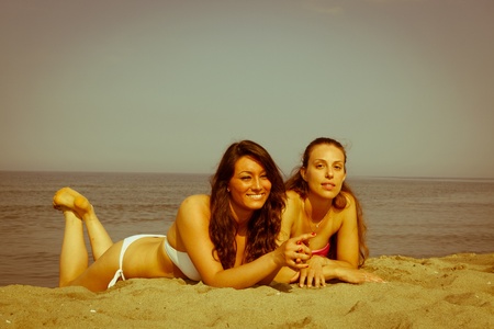Two Young Women Sunbathingの写真素材