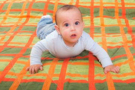 Little Child on the Bedの写真素材
