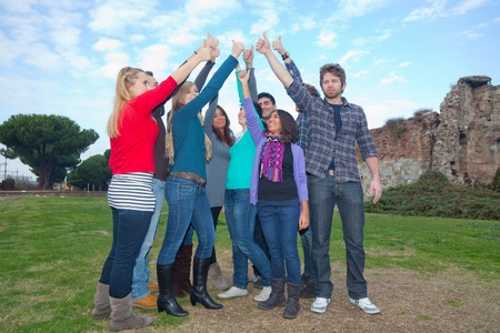 College Students with Thumbs Upの写真素材