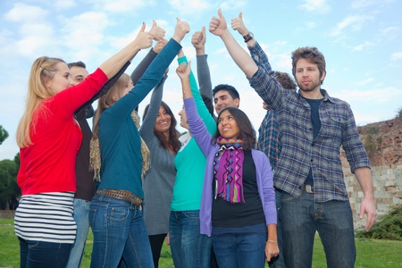 College Students with Thumbs Upの写真素材