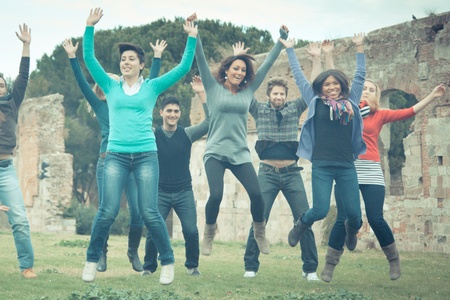 Multicultural College Students Jumpingの写真素材